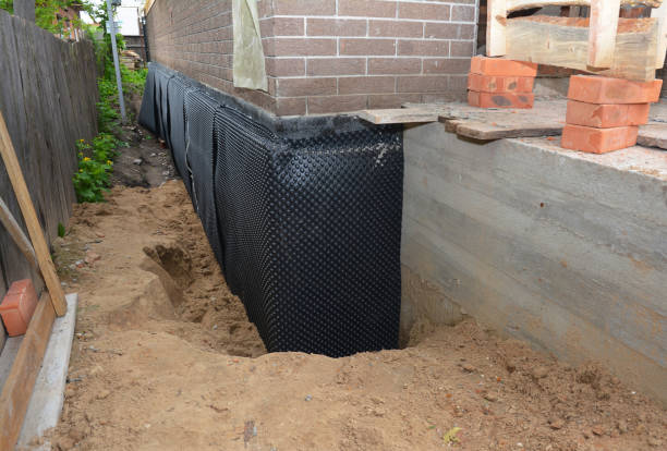 Happy homeowners after waterproofing job in Upland
